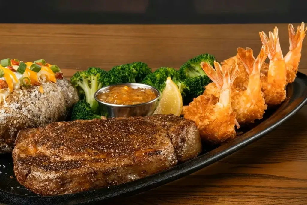 13oz Rockhampton Ribeye* & Choice of Shrimp
